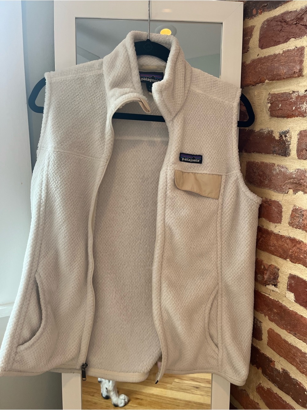 Patagonia Womenโs Cream Fleece Vest with Tan Pocket